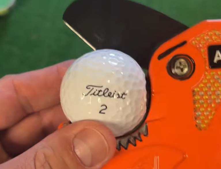 TaylorMade Tour Response vs Titleist Tour Soft golf balls cut open with my cutting tool jeff